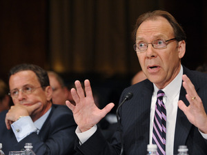 Sprint CEO Daniel Hesse (right) testifies against the proposed AT&T merger with T-Mobile USA last month at a Senate Judiciary Committee hearing as T-Mobile USA President and CEO Philipp Humm looks on. Sprint CEO Daniel Hesse (right) testifies against the proposed AT&T merger with T-Mobile USA last month at a Senate Judiciary Committee hearing as T-Mobile USA President and CEO Philipp Humm looks on.