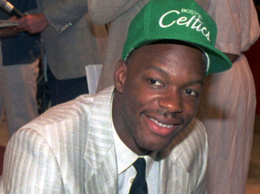 Len Bias wears a Boston Celtics hat after being selected as the No. 2 pick in the 1986 NBA draft.