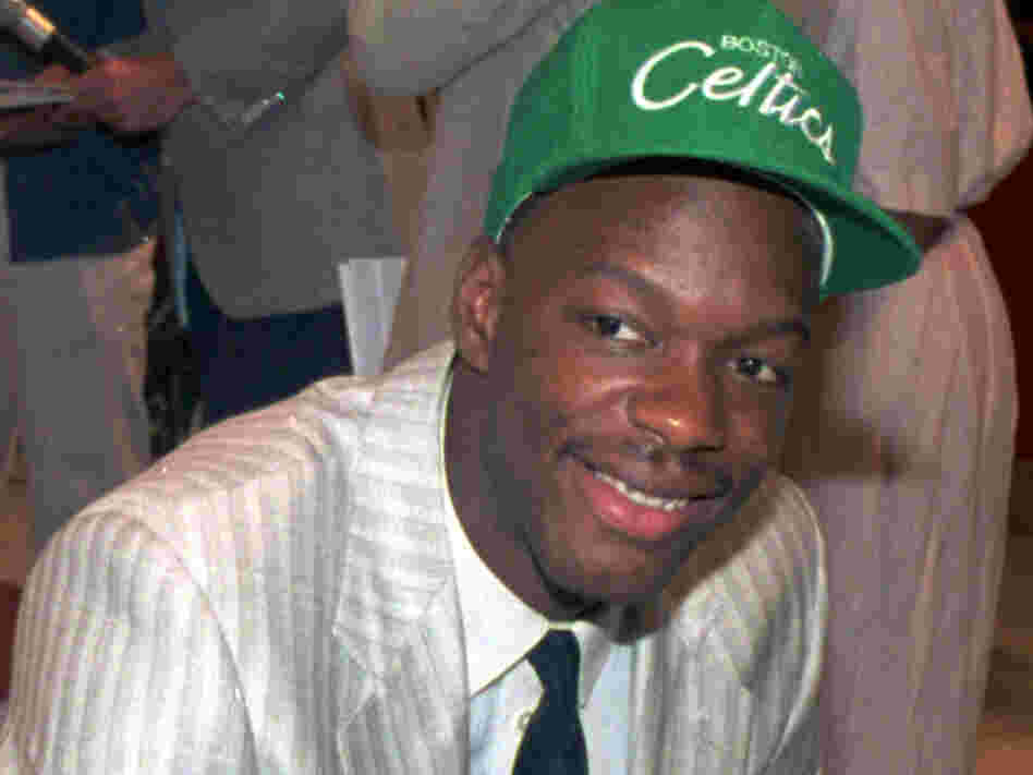 Len Bias wears a Boston Celtics hat after being selected as the No. 2 pick in the 1986 NBA draft.