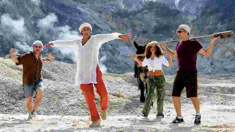 Enter Sandmen: Musical performances make up the bulk of Passione, and director John Turturro often can't resist getting in on the action. Max Casella (from left), Fiorello, an unnamed dancer and Turturro search for Neapolitan oil in the song "Caravan Petrol." Enter Sandmen: Musical performances make up the bulk of Passione, and director John Turturro often can't resist getting in on the action. Max Casella (from left), Fiorello, an unnamed dancer and Turturro search for Neapolitan oil in the song "Caravan Petrol."