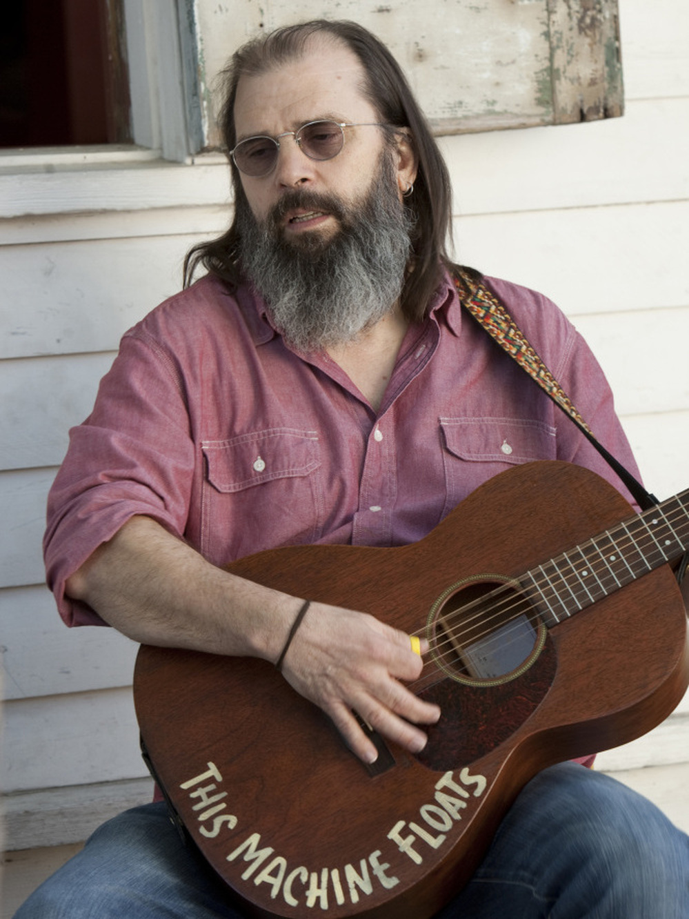 Steve Earle as Harley.