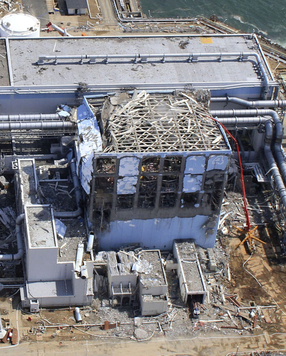 This March 24 aerial photo shows the extent of damage at the Fukushima Dai-ichi nuclear power plant in Japan. The 40-foot-tall tsunami destroyed the electrical and cooling systems, resulting in meltdowns at some of the reactors.