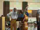 Ron Carter (left, as himself) looks on as Albert Lambreaux (Clarke Peters) attempts to show him a thing or two on bass, in Treme. Ron Carter (left, as himself) looks on as Albert Lambreaux (Clarke Peters) attempts to show him a thing or two on bass, in Treme.