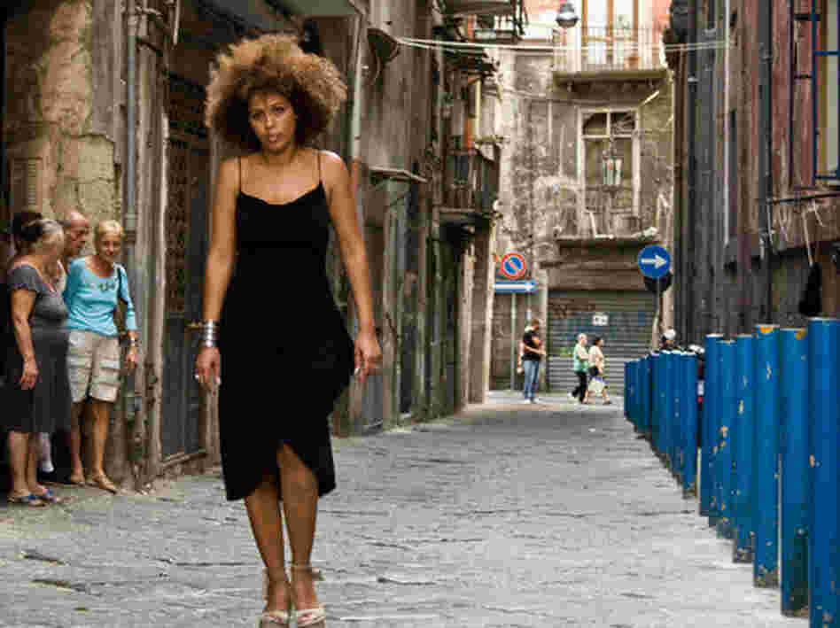Passione hails Naples as a cultural playground for artists like M'Barka Ben Taleb, a Tunisian singer who combines Arab and Neapolitan influences.