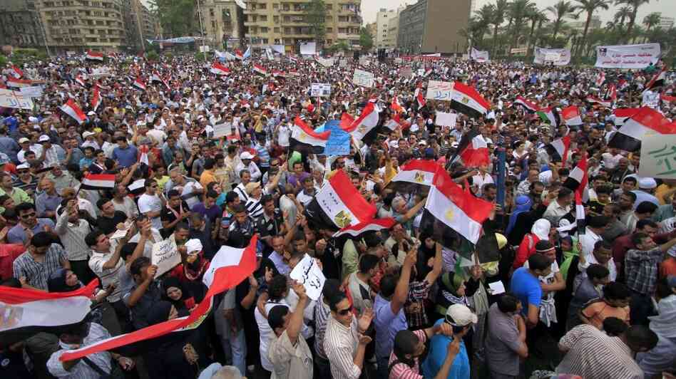 Egyptian protesters wave national flags as they attend a rally in Tahrir Square in Cairo on May 27. Egyptian protesters wave national flags as they attend a rally in Tahrir Square in Cairo on May 27.