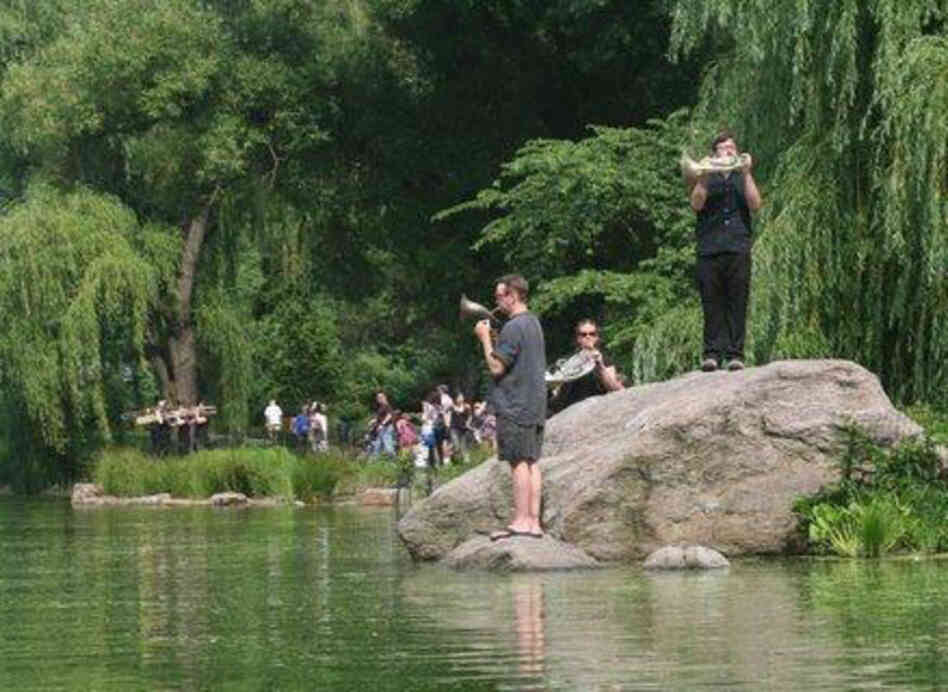 Gregory Evans, Sarah Baird Knight, and Nathan Koci perform 'Swelter,' a new ambient piece written to be played on the Central Park Lake, as part of Make Music New York on June 21.