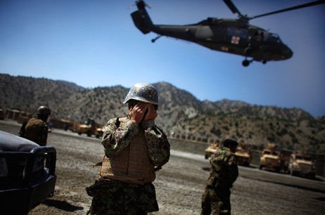 A US Army medevac Blackhawk helicopter lifts off carrying a critically injured Afghan National Army soldier as his fellow soldiers watch at Combat Outpost Wilderness in Paktia provence, eastern Afghanistan. The ANA soldier was struck in the head with shrapnel during an enemy mortar barrage at the remote base in the mountains of eastern Afghanistan. A US Army medevac Blackhawk helicopter lifts off carrying a critically injured Afghan National Army soldier as his fellow soldiers watch at Combat Outpost Wilderness in Paktia provence, eastern Afghanistan. The ANA soldier was struck in the head with shrapnel during an enemy mortar barrage at the remote base in the mountains of eastern Afghanistan.