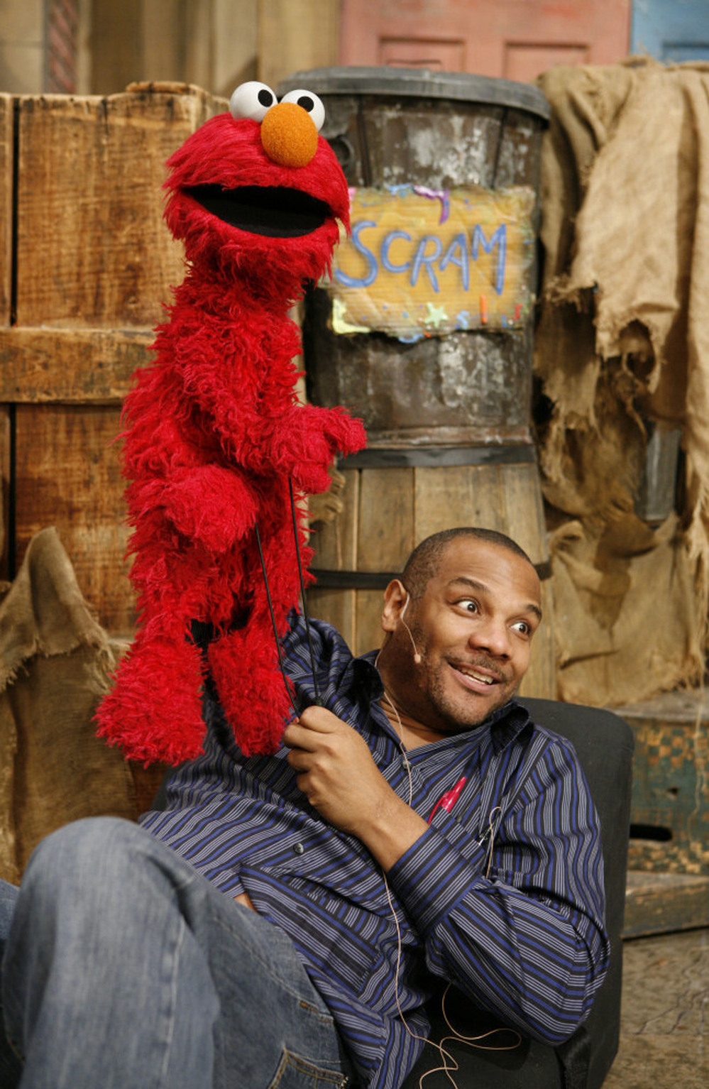 Elmo and Kevin Clash, photographed on the Sesame Street set in 2006.