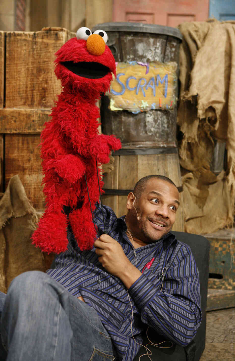 Elmo and Kevin Clash, photographed on the Sesame Street set in 2006.
