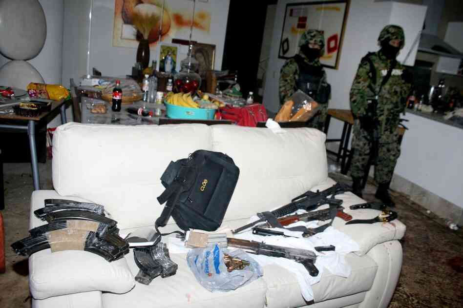 Killed Dec. 16, 2009: Arturo Beltran Leyva, then-leader of the Beltran Leyva gang, is killed in a shootout with some 200 Mexican marines in the city of Cuernavaca. Mexican troops stand guard the following day inside the apartment where Beltran Leyva and three members of his cartel were slain. 