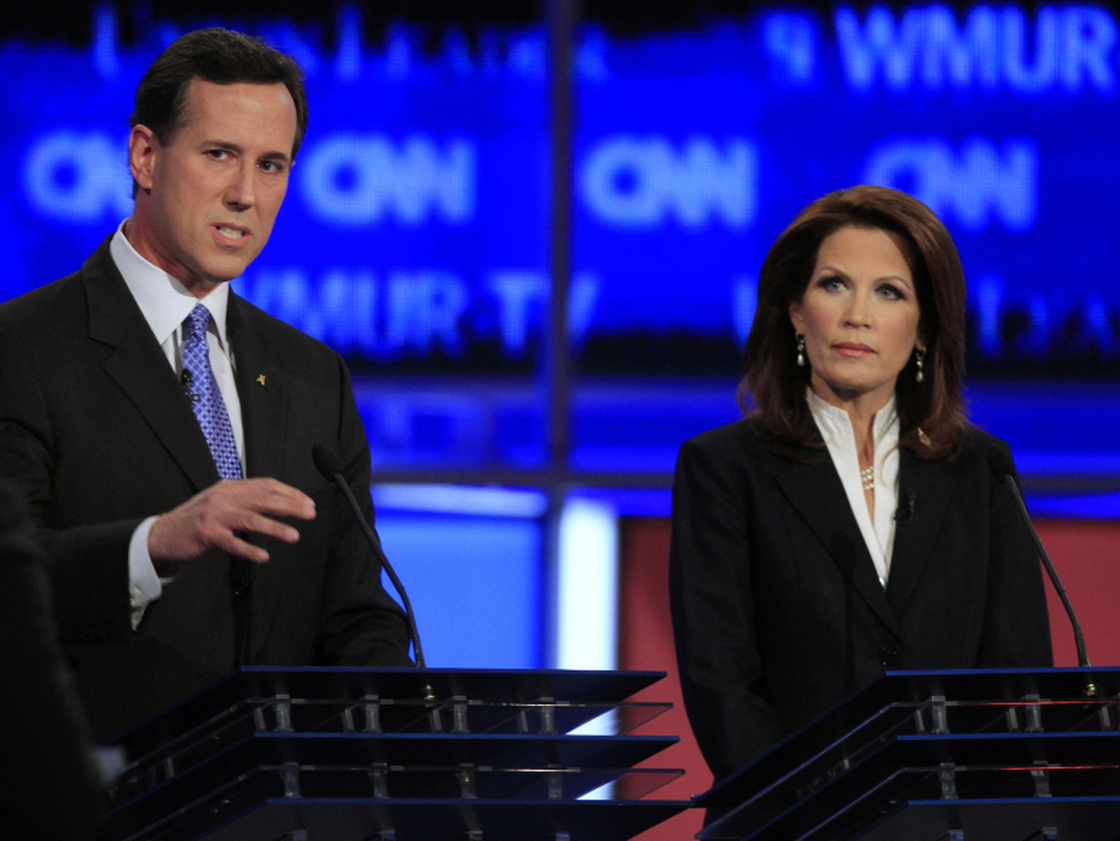 Former Pennsylvania Sen. Rick Santorum and Rep. Michele Bachmann, pictured here at the New Hampshire Republican presidential debate on June 13, have signed a pledge to push through anti-abortion measures if elected president.
