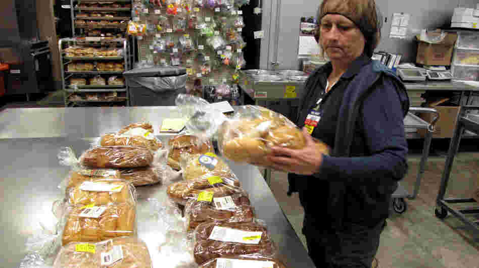 Jackie Barnes, a Walmart employee, packs bread for donation. Last year, the company pledged to donate $2 billion in food and other aid to food banks over five years, the largest donation of its kind. Jackie Barnes, a Walmart employee, packs bread for donation. Last year, the company pledged to donate $2 billion in food and other aid to food banks over five years, the largest donation of its kind.