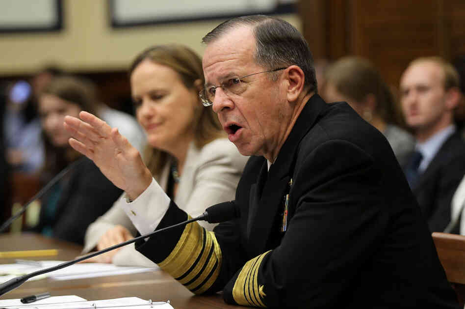 Chairman of the Joint Chiefs of Staff Adm. Michael Mullen (R) and Under Secretary of Defense for Policy Michele Flournoy testify during a hearing before the House Armed Services Committee.