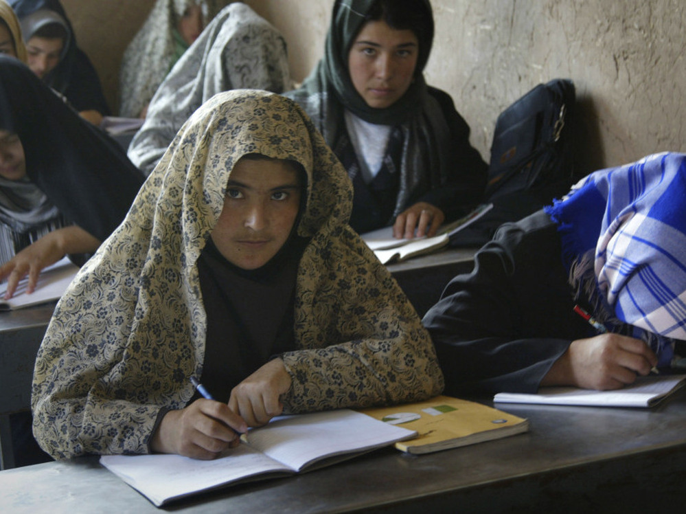 June 4, 2011: women and girls at a literacy class in Anjil, Afghanistan.