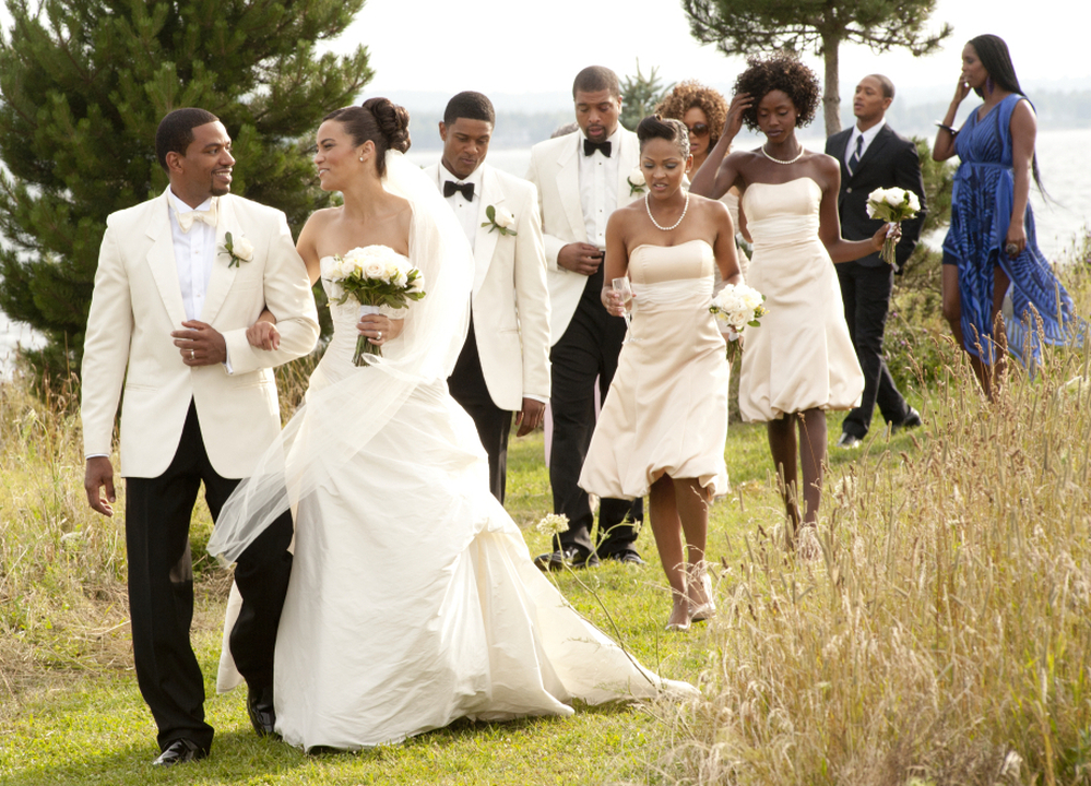 Laz Alonso (left) and Paula Patton star as a bride and groom from opposite ends of the socioeconomic spectrum in Jumping the Broom. The film grossed $36 million during its U.S. run in May.