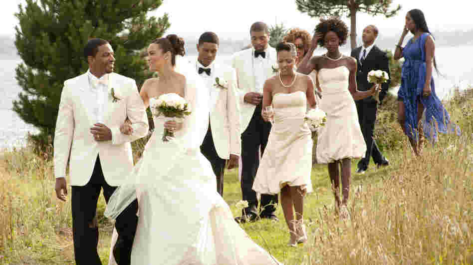 Laz Alonso (left) and Paula Patton star as a bride and groom from opposite ends of the socioeconomic spectrum in Jumping the Broom. The film grossed $36 million during its U.S. run in May.