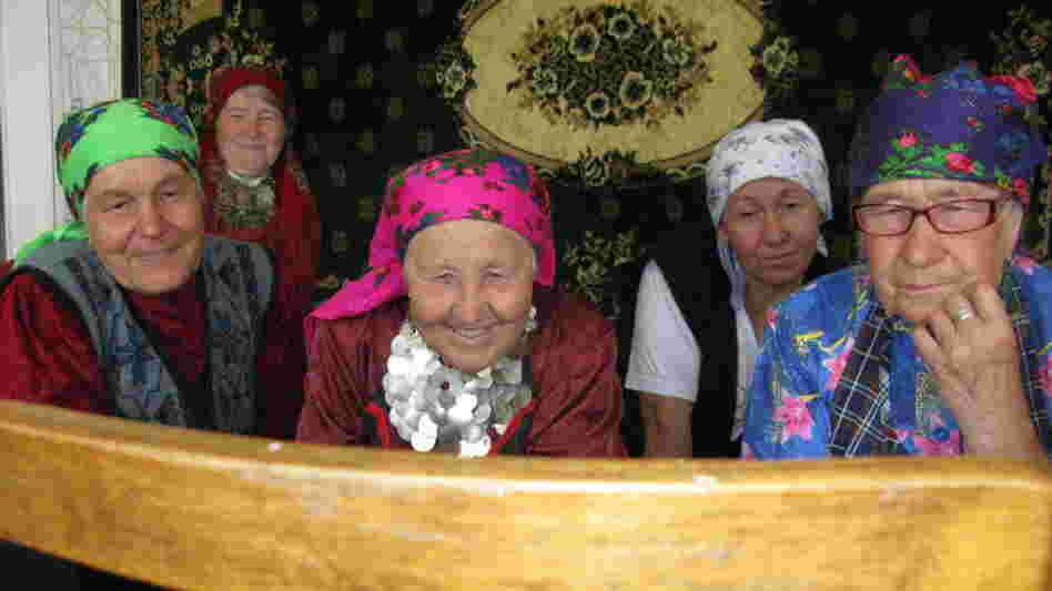 The "Buranovo Babushkas" watch video, for the first time, of two of their members appearing on Russia's Who Wants to Be a Millionaire? program.