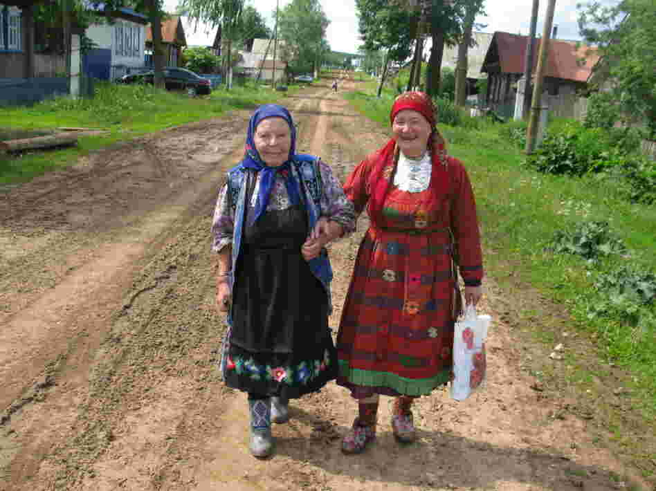 Elizaveta Zarbatova (left), who walks with Alevtina Begisheva, is the oldest member of the group at 84. She was widowed in 1957 when her husband was  electrocuted on the job.                           "After I lost my husband, I received some kind  of gift – the ability to compose music," she says. "The music comes from the heart. The suffering  comes right from my heart."