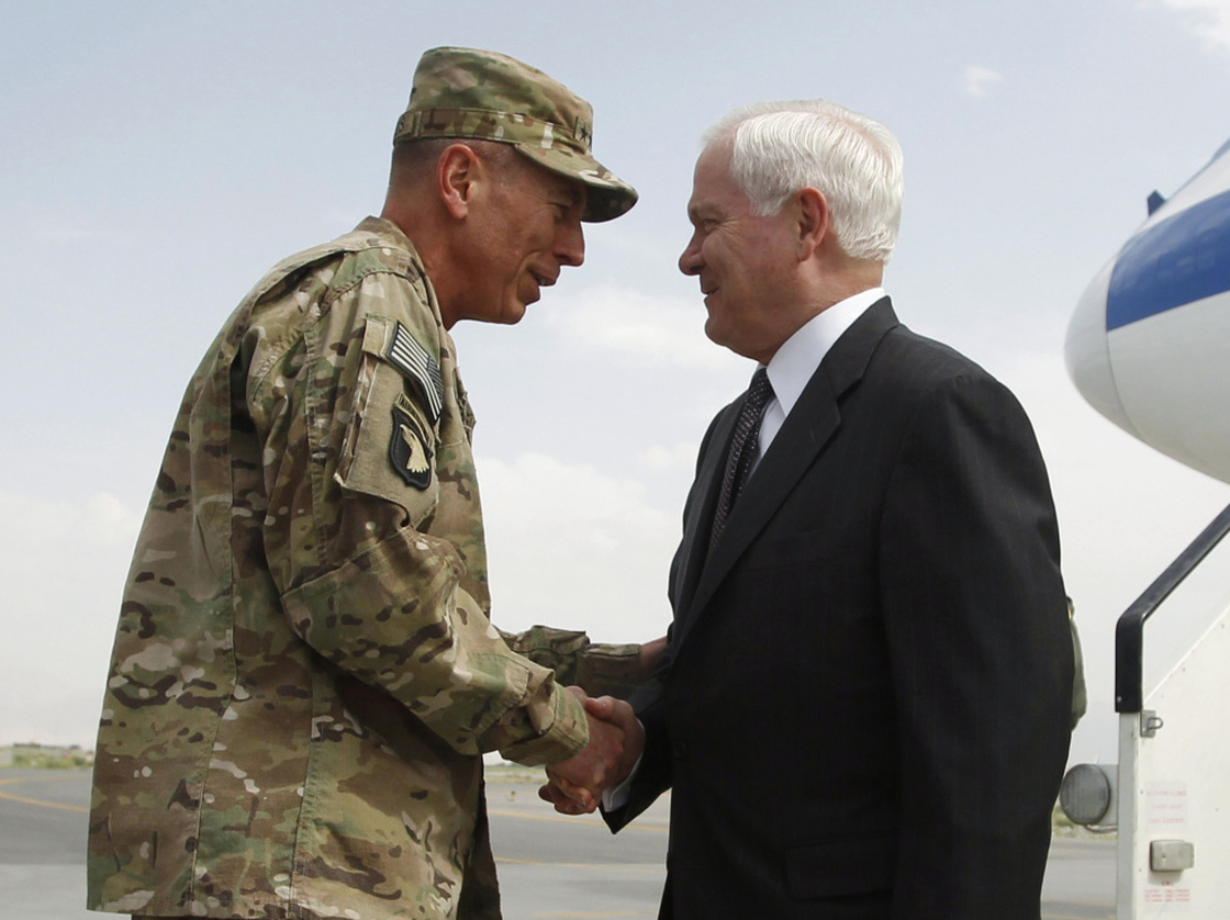 Defense Secretary Robert Gates was greeted on his arrival in Kabul by Gen. David Petraeus,  June 4, 2011.