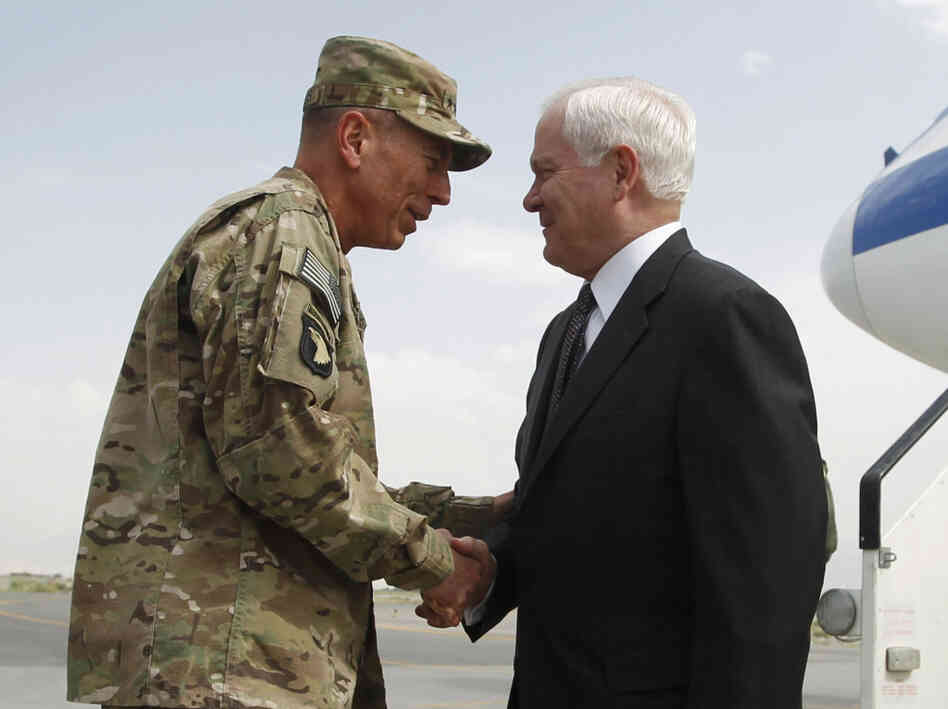 Defense Secretary Robert Gates was greeted on his arrival in Kabul by Gen. David Petraeus,  June 4, 2011.