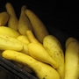 Walmart store manager Emily Bowman notices some yellow squash with brown spots — and takes about 40 off the shelves and puts them on a donation cart.