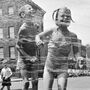 Two children jumping through a water hydrant's shower on a New York street. They have come from a neighbouring co-educational playgroup organised by the city's Police Department. (Photo by Orlando/Getty Images) Two children jumping through a water hydrant's shower on a New York street. They have come from a neighbouring co-educational playgroup organised by the city's Police Department. (Photo by Orlando/Getty Images)