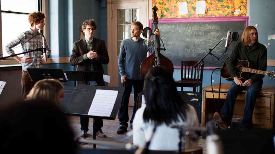 The Mason Jar team conducts a recording session with a chamber orchestra and The Wood Brothers (sitting on the desk, Chris on the left and Olive on the right) in a classroom at St. Cecilia's Church in Brooklyn.