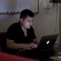 Jose Antonio Vargas works in his New York City apartment May 26. Vargas, a journalist, has revealed to the public that he is an illegal immigrant.
