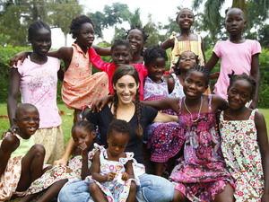 Four years ago, Katie  Davis was homecoming queen at her high school in Tennessee. Today, she cares for 13 abandoned girls at her home in Uganda.