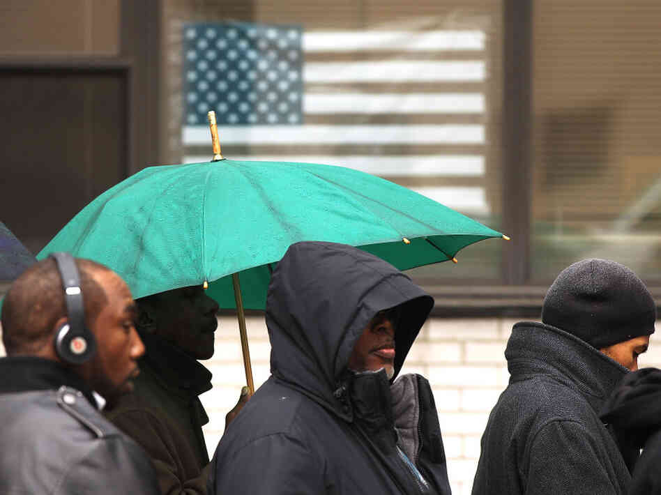 People looking for jobs wait in line to speak with potential employers at the Brooklyn Job Fair on April 13 in New York City. People looking for jobs wait in line to speak with potential employers at the Brooklyn Job Fair on April 13 in New York City.