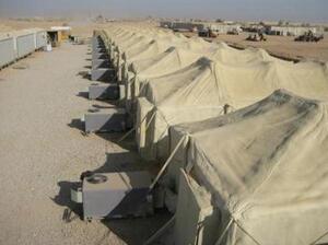 Air conditioners keep tents cool on a U.S. military base in Iraq. The tents have been treated with polyurethane foam to increase energy efficiency. Air conditioners keep tents cool on a U.S. military base in Iraq. The tents have been treated with polyurethane foam to increase energy efficiency.