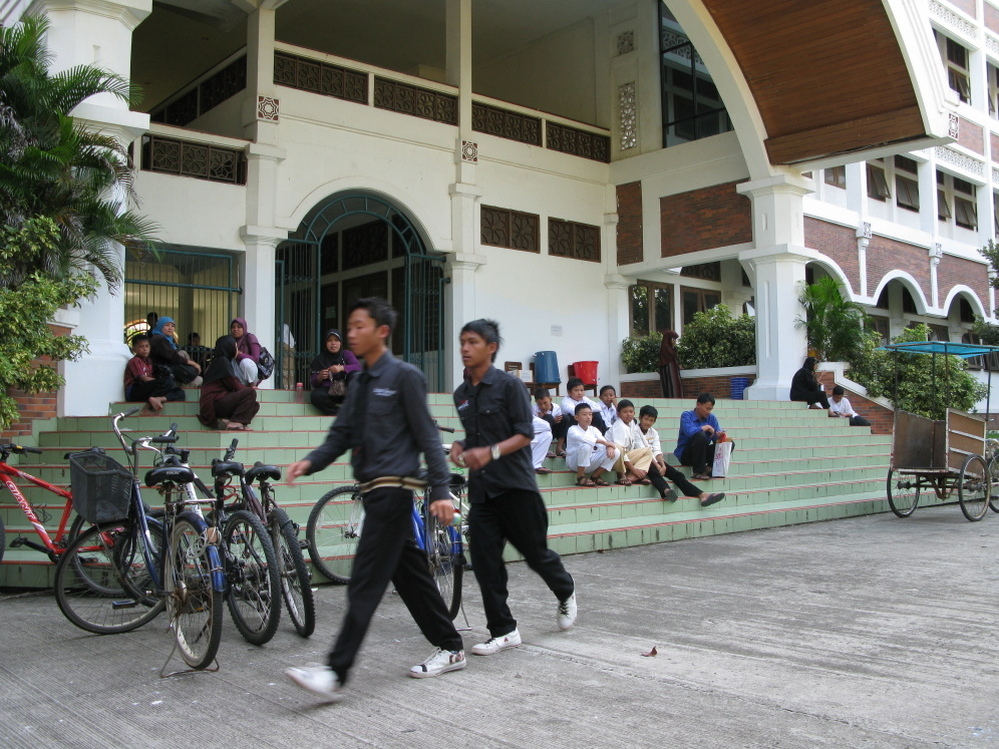 Students and parents wait to register for a new term at Al-Zaytun, Indonesia's largest "pesantren," or  Islamic boarding school.