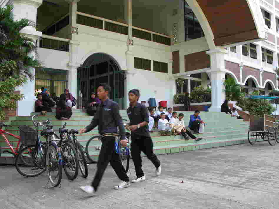 Students and parents wait to register for a new term at Al-Zaytun, Indonesia's largest "pesantren," or  Islamic boarding school.
