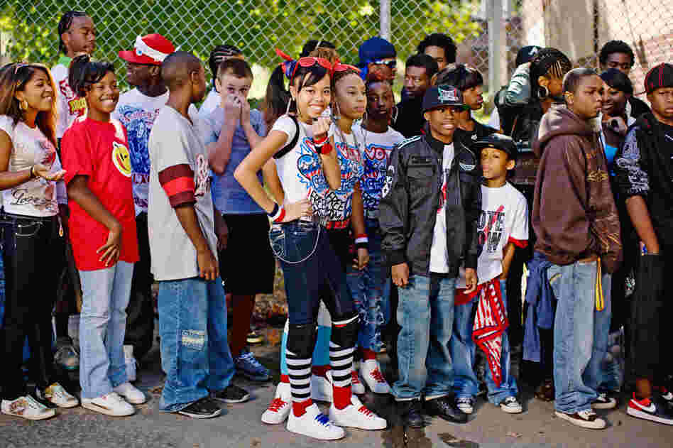 A line of extras wait for entry and their chance to be part of a Soulja Boy music video.