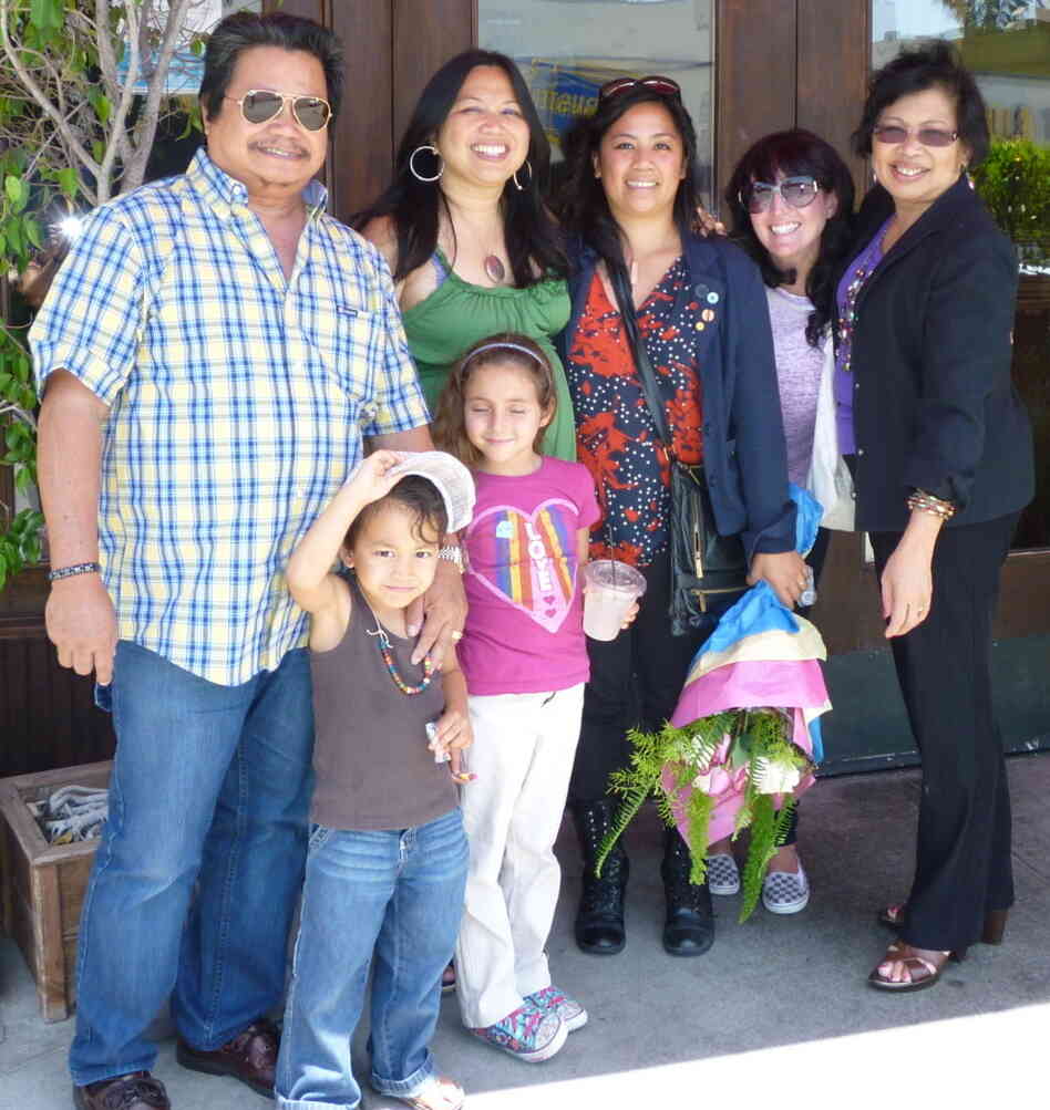 Jolivette and her family met up for  lunch after she and Charlyne filed their papers. Clockwise from top left: dad Ernesto; Jolivette; Charlyne; sister-in-law Regina; mother Dahlia; niece Leila; and nephew SoulKaya.