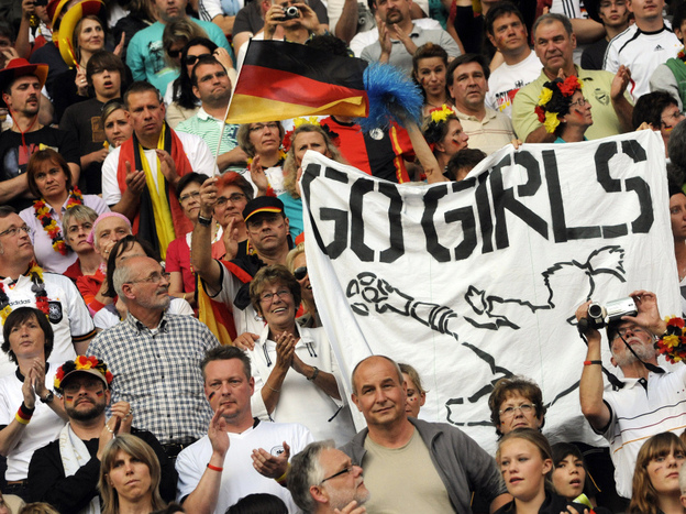 Soccer fans attend the women's World Cup opener between Germany and Canada. In Germany, the game drew a TV audience of more than 18 million, or a quarter of the country's population — better stats than some men's matches garner.