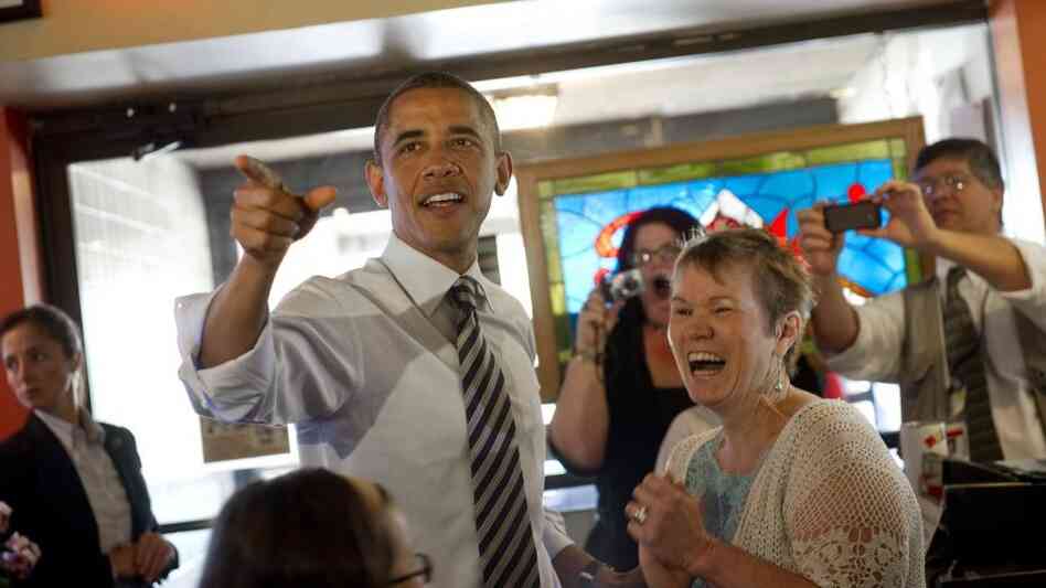 President Obama greets patrons at Ross' Restaurant in Bettendorf, Iowa, on Tuesday. In 2008, the president's unexpected victory in the state helped propel his campaign. President Obama greets patrons at Ross' Restaurant in Bettendorf, Iowa, on Tuesday. In 2008, the president's unexpected victory in the state helped propel his campaign.