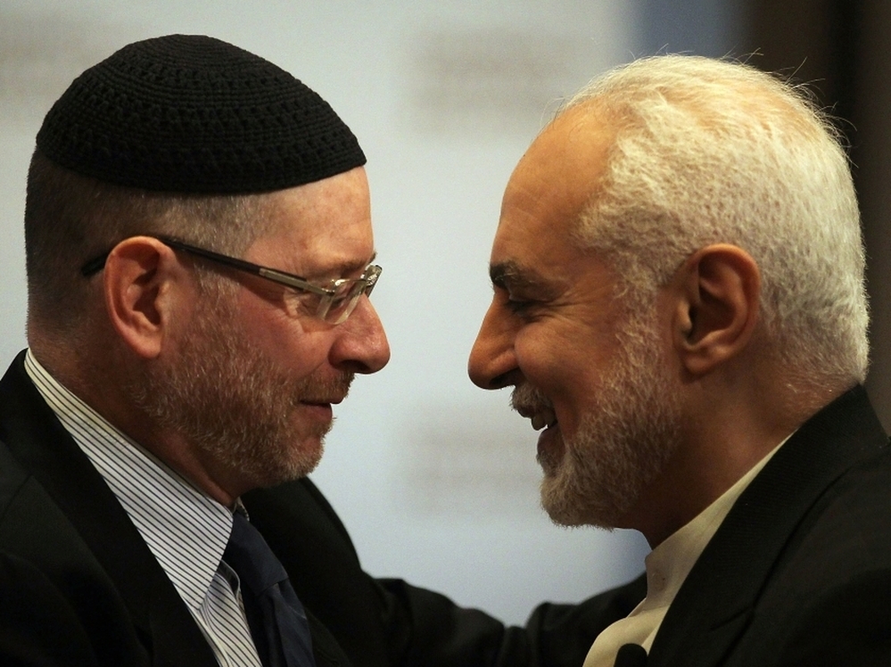 Imam Feisal Abdul Rauf (right), greets a Jewish colleague before speaking at the Council on Foreign Relations in September, 2010.
