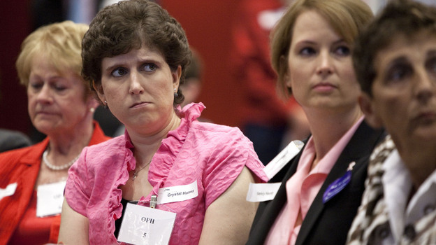 From left, Priscilla Howard, Crystal Hanna and Nancy Haunty, all breast cancer patients, listen at a Food and Drug Administration hearing on Avastin in Silver Spring, Md., on Tuesday.