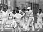 In this 1976 match between England and the West Indies, the team celebrates the dismissal of Tony Greig.