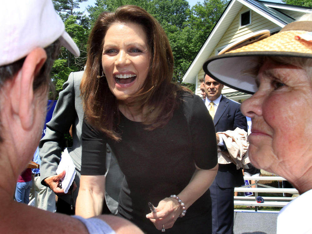 Rep. Michele Bachmann chats with supporters in Raymond, N.H., June 28, 2011.
