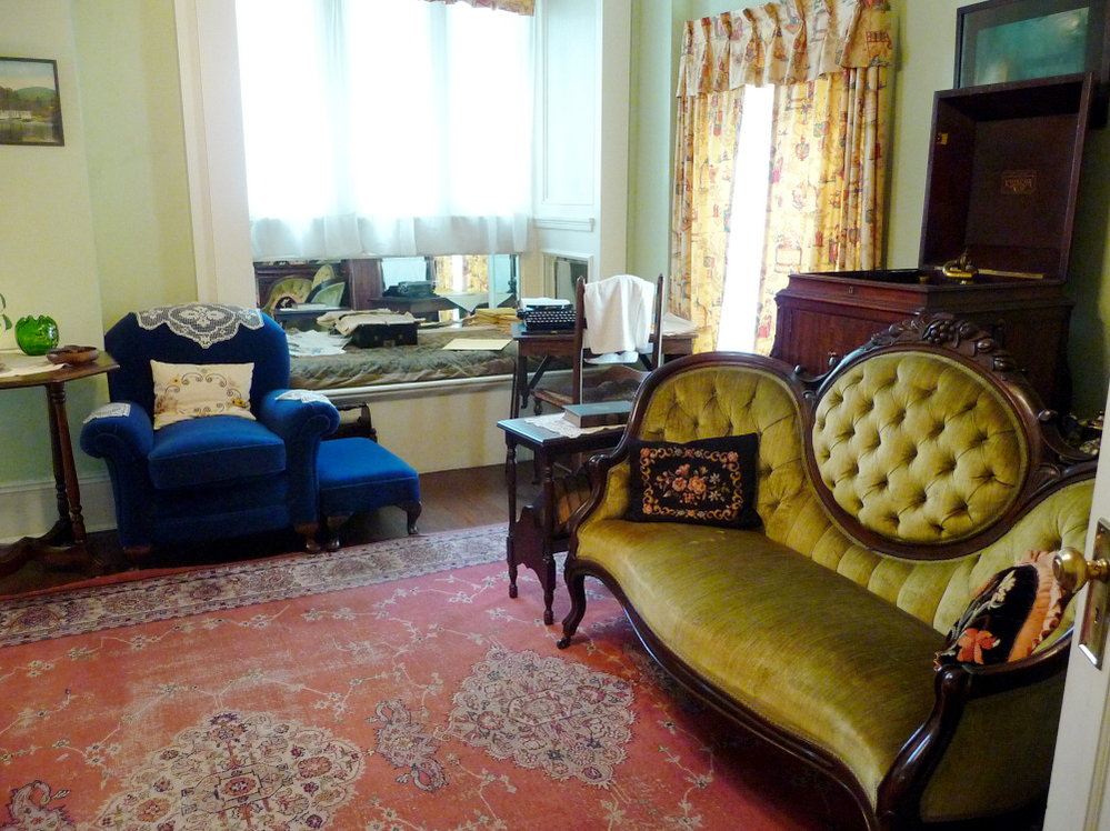Gone with the Wind was written on a wooden desk, angled in a corner of Mitchell's parlor. A replica of the desk, seen in the far corner of the photo above, is on display at Mitchell's apartment. Click to see the actual desk, which is on display at the Atlanta History Center.