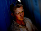 Marine Lance Cpl. Andrew Zemore, 23, from Fredericksburg, Va., is a self-described troublemaker who liked to party too much. Zemore said he fell into the Marine Corps and now is on a Explosives Ordinance Disposal team, searching out bombs with a hand-held metal detector. Marine Lance Cpl. Andrew Zemore, 23, from Fredericksburg, Va., is a self-described troublemaker who liked to party too much. Zemore said he fell into the Marine Corps and now is on a Explosives Ordinance Disposal team, searching out bombs with a hand-held metal detector.