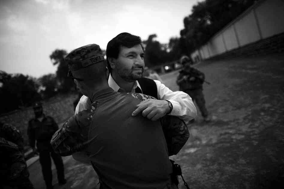 Gov. Abdul Jabbar Naeemi of Khost province says goodbye to Col. Chris Toner, commander of the 3rd Brigade Combat Team, 1st Infantry Division, after lunch and meetings at the governor's compound in the provincial capital.