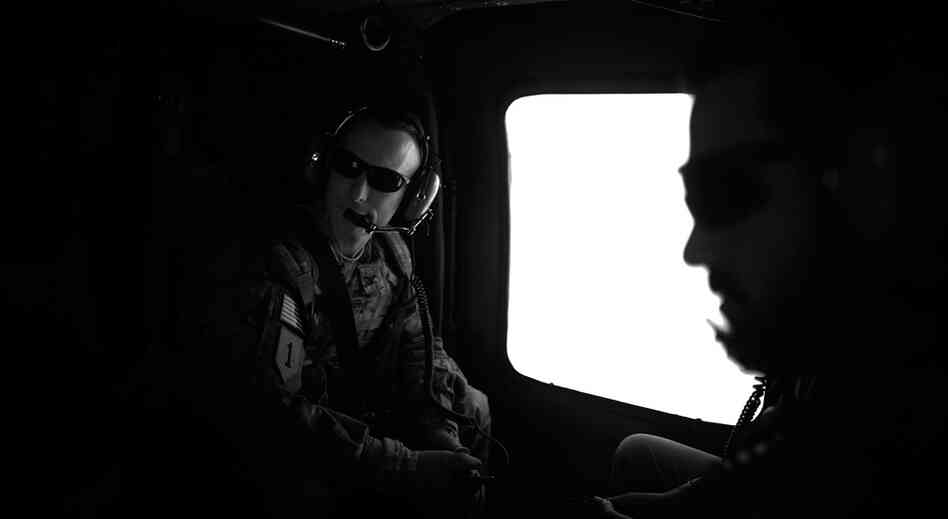 Toner flies in a Black Hawk helicopter near the Afghanistan-Pakistan border. The boundary is a source of frustration for Toner in the fight against the Haqqani network, which trains fighters inside Pakistan.