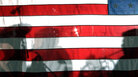 BOSTON, MA - SEPTEMBER 14: Shadows of musicians from the Boston Symphony Orchestra fall on the American flag during a performance. BOSTON, MA - SEPTEMBER 14: Shadows of musicians from the Boston Symphony Orchestra fall on the American flag during a performance.