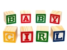 Blocks that spell out "baby girl." Blocks that spell out "baby girl."
