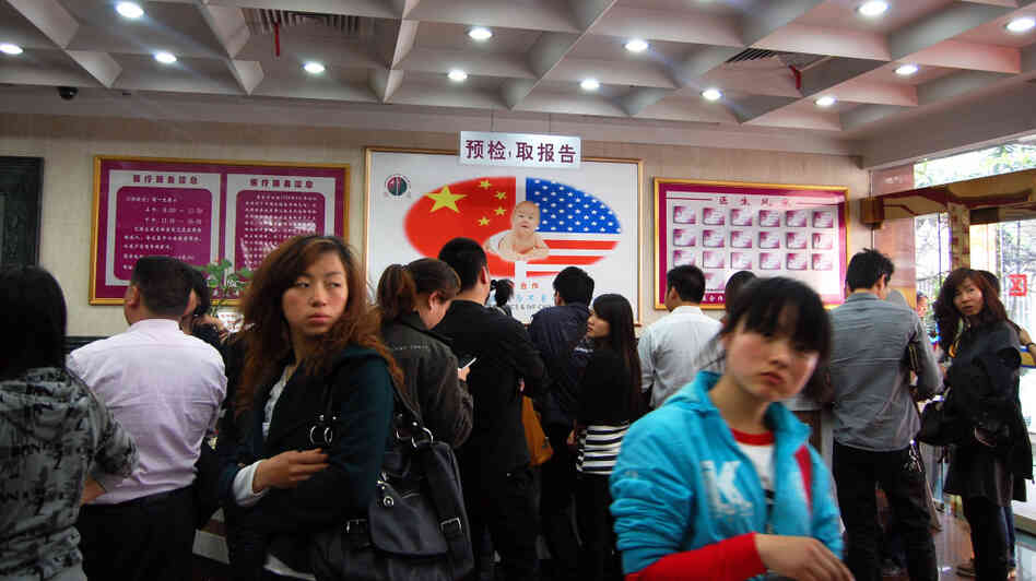 The lobby of the Shanghai Ji Ai Genetics and IVF Institute is filled with clients waiting to see doctors.