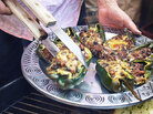 Steven Raichlen takes vegetarian chiles rellenos off the grill. Steven Raichlen takes vegetarian chiles rellenos off the grill.