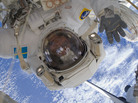 Mission Specialist Christer Fuglesang waves on a spacewalk during a 2009 shuttle visit to the International Space Station. Mission Specialist Christer Fuglesang waves on a spacewalk during a 2009 shuttle visit to the International Space Station.